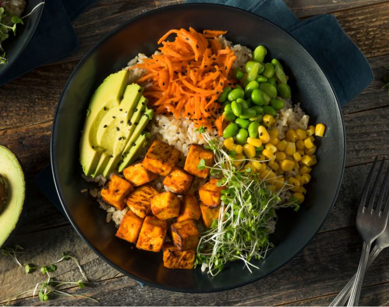 Healthy Organic Tofu and Rice Buddha Bowl with Veggies. Courtesy of Getty Images.