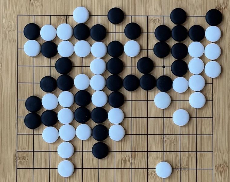Close up of "Go" strategy board game