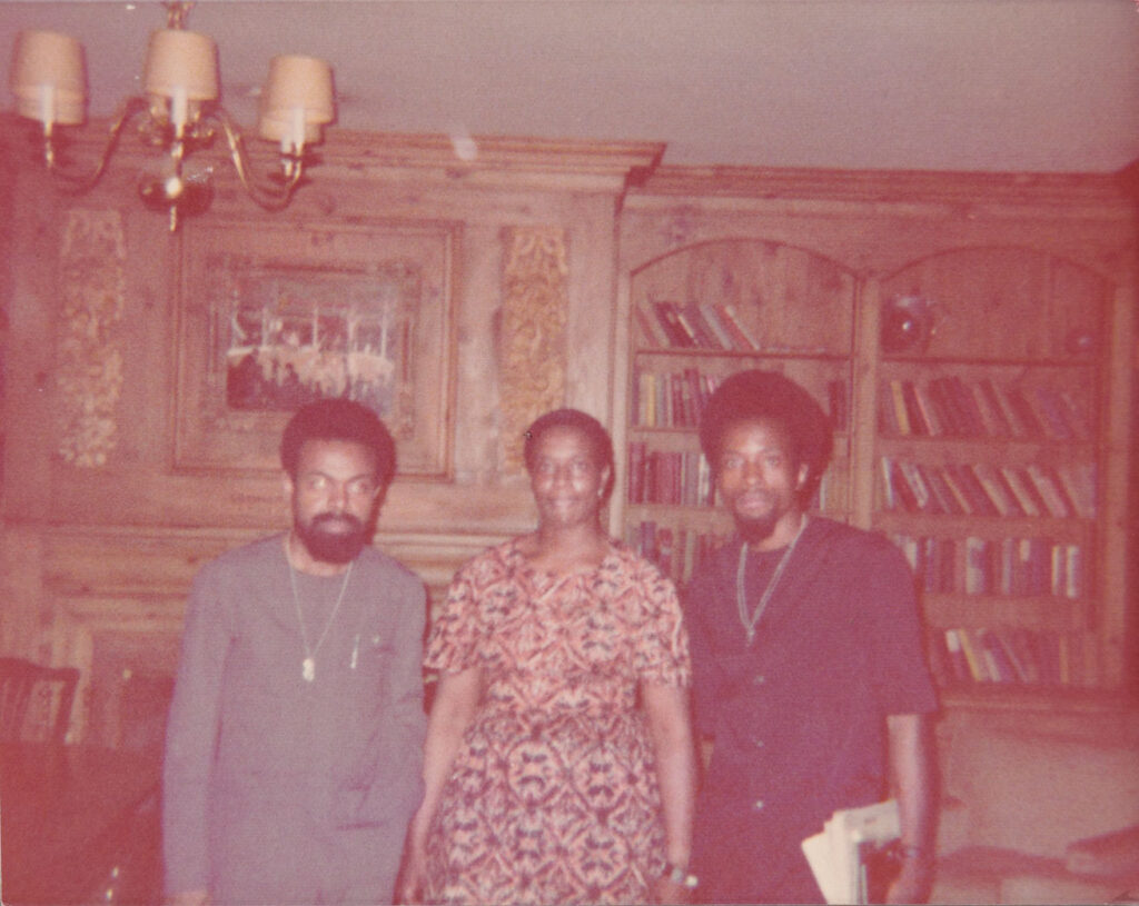 Photo of Amiri Baraka with two others during a visit to Karamu House in 1974
