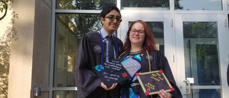 Photo of Viral Mistry and Irene Prilutskiy posing together on their graduation day at CWRU