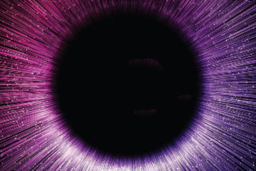Photo illustration of purple light coming off a black circle