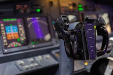 Airplane driving direction joystick, courtesy of Getty Images.