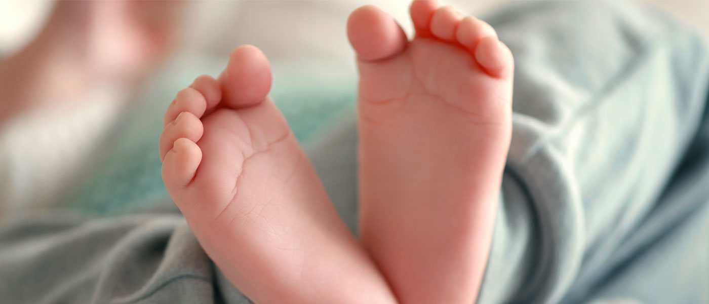 Close up on a photo of a sleeping baby's feet