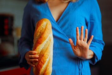 Woman with celiac disease refusing gluten. Courtesy of Getty Images.