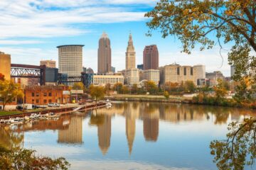 Photo of Cleveland skyline on the Cuyahoga River in autumn.