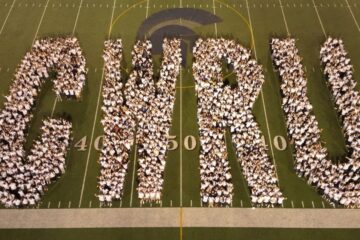 Students of the Class of 2028 spell out "CWRU"