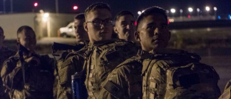 Photo of Brendan Silva lined up waiting to board the plane for deployment