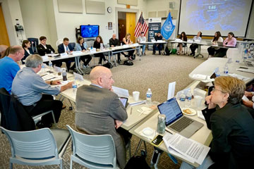 International humanitarian law experts gathered in a meeting during a conference at CWRU designed to prepare report on updating the Geneva Conventions