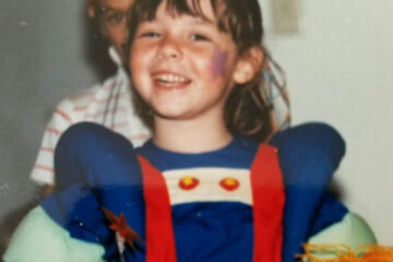 Photo of CWRU staff member Cami Ross dressed up as Rainbow Brite as a child