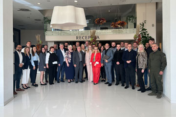 Michael Scharf poses for a photo with Ukrainian prosecutors and judges during a workshop