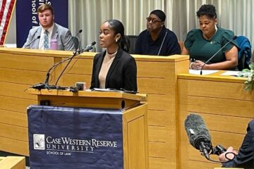 Law student Bobby Read, Law Student Yaninna Sharpley-Travis (speaking), Michael Anderson, Stephanie Howse-Jones