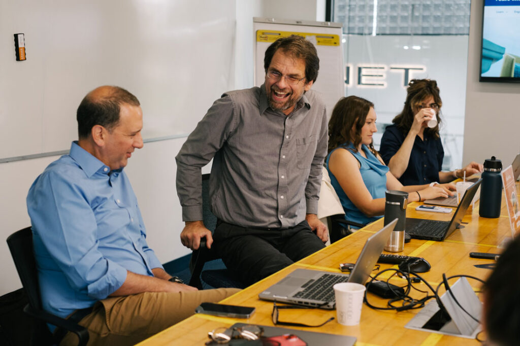 Photo of Bob Sopko smiling during a meeting