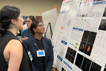 Photo of Vani Thakur presenting her research at another event