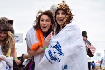 Participants from the Chicago Polar Plunge wrapped in blankets